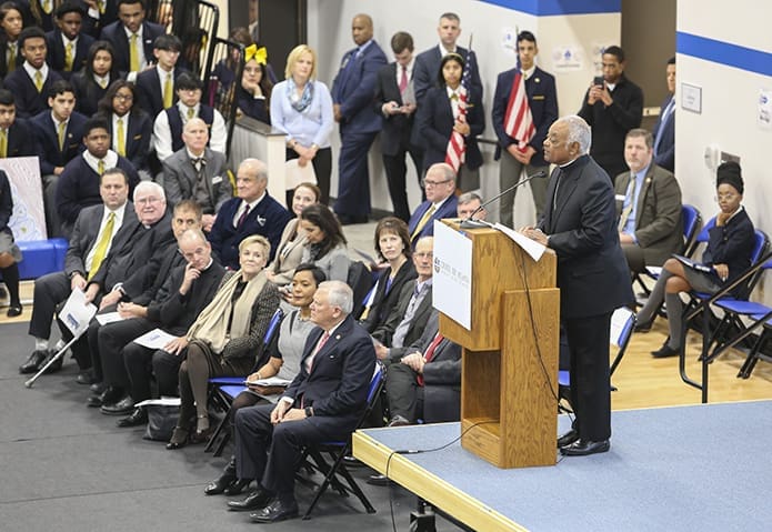 Archbishop Wilton D. Gregory addresses the crowd on hand for the Jan. 30 Cristo Rey Atlanta Jesuit High School building dedication. The school occupied the former headquarters of the Atlanta Archdiocese on West Peachtree Street for nearly three years, before moving to its new location on Piedmont Avenue. Photo By Michael Alexander