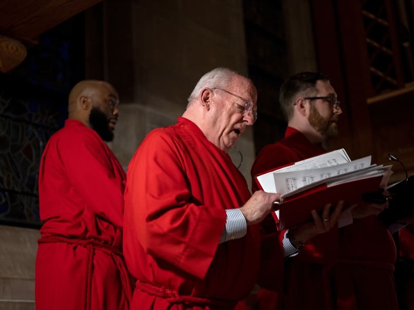 The choir sings the liturgy during a Tenebrae service at Cathedral of Christ of the King. Tenebrae is a solemn prayer service of song and ure, marked by the gradual extinguishing of lights until the service ends in darkness and silence. Photo by Johnathon Kelso